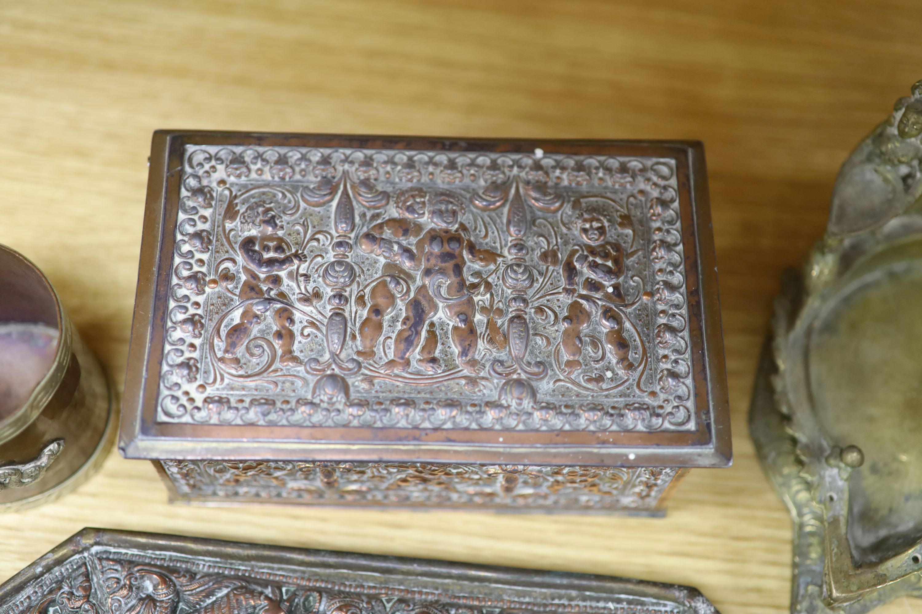 A pair of Indian cast metal trays and four other items, including a pair of octagonal embossed dishes, 46cm